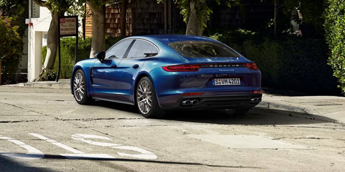 Blue Porsche Panamera parked on street